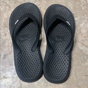 Nike Kids flip flops.